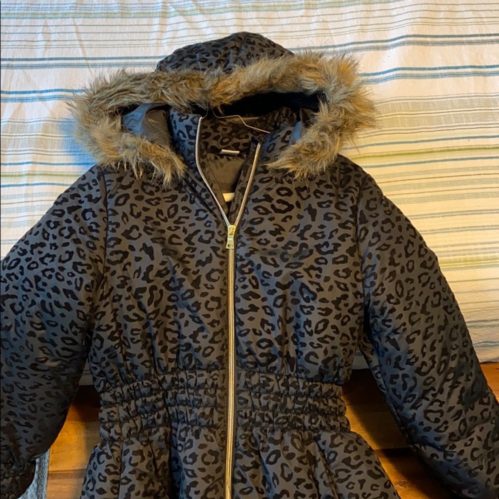Girls black puffer coat.